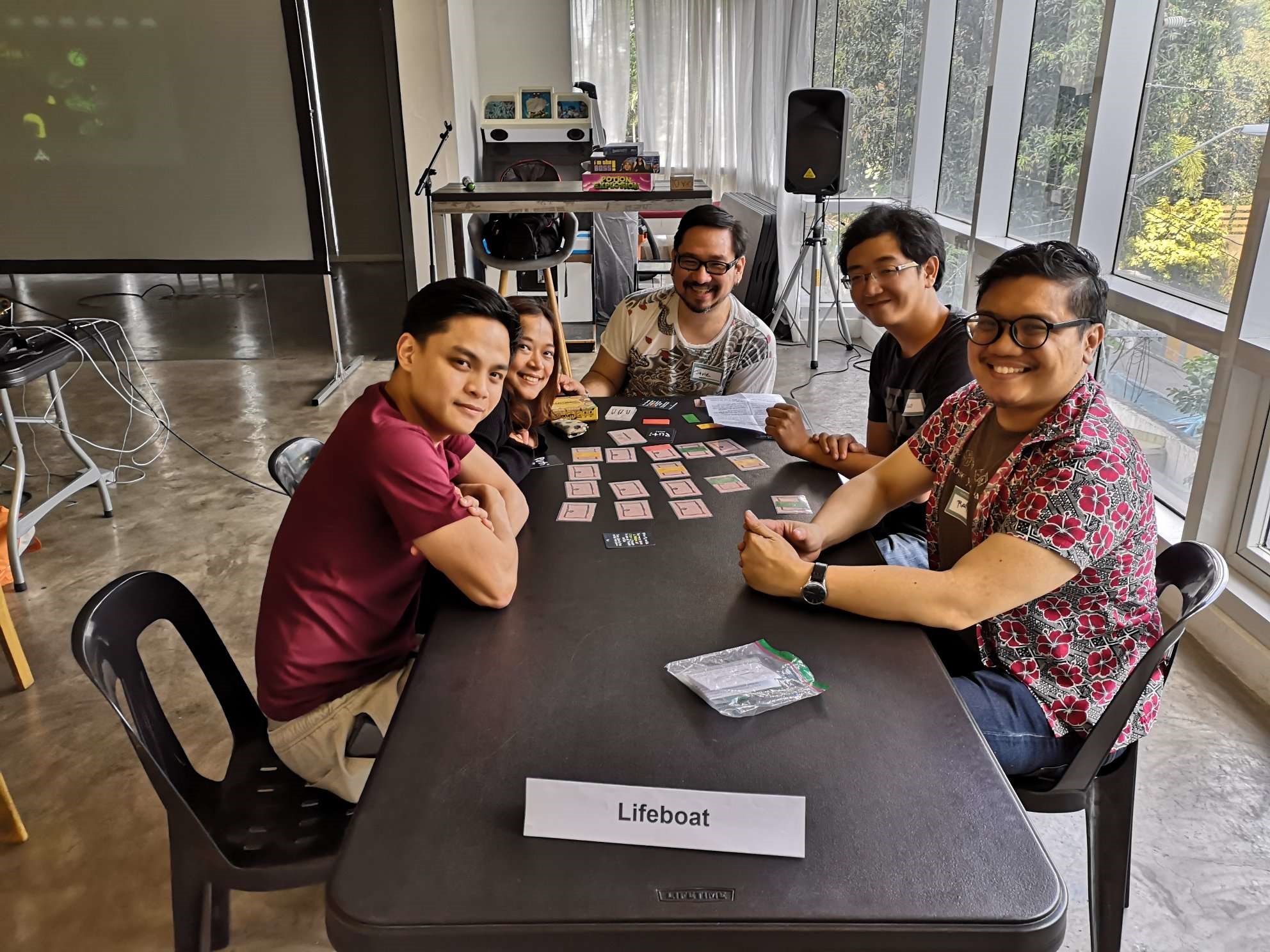 We smiled for the photo, but "Puti," a Filipino-made horror card game, wiped the grin off of our faces soon enough.